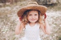 Little girl wearing a hat outdoors Royalty Free Stock Photo
