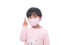 Little girl wearing a mask in front of white background Royalty Free Stock Photo