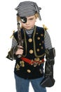 Little girl wearing pirate costume holding a gun Royalty Free Stock Photo