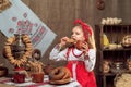 Adorable girl drinking tea from samovar Royalty Free Stock Photo