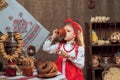 Adorable girl drinking tea from samovar Royalty Free Stock Photo