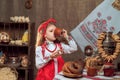 Adorable girl drinking tea from samovar Royalty Free Stock Photo