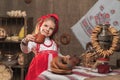 Adorable girl drinking tea from samovar Royalty Free Stock Photo