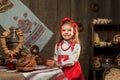 Adorable girl drinking tea from samovar Royalty Free Stock Photo