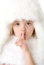 Little girl wearing a white fur coat and hat Royalty Free Stock Photo