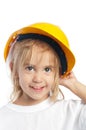 Little girl wearing yellow hard hat Royalty Free Stock Photo