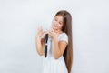 Cute smiling little girl combing her hair comb makes hair Royalty Free Stock Photo