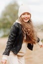 little girl in white hat and black leather jacket autumn photography