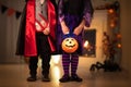 Kids in witch costume on Halloween trick or treat Royalty Free Stock Photo