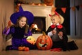 Kids in witch costume on Halloween trick or treat Royalty Free Stock Photo