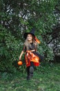 Little girl in witch costume on Halloween trick or treat outdoor Royalty Free Stock Photo