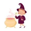 Little Girl Witch Wearing Purple Dress and Pointed Hat Practising Witchcraft and Doing Magic with Boiling Cauldron Royalty Free Stock Photo