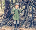 Little girl in the wood near the hut Royalty Free Stock Photo