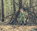 Little girl in the wood near hut Royalty Free Stock Photo