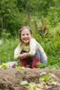 Little girl working in the garden Royalty Free Stock Photo