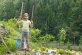 Little girl working in the garden Royalty Free Stock Photo