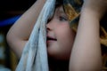 Little girl wrapped in pool towel Royalty Free Stock Photo