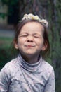 Little girl with a wreath of daisies on her head Royalty Free Stock Photo