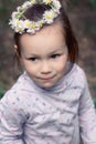 Little girl with a wreath of daisies on her head Royalty Free Stock Photo