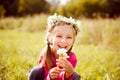 Little girl in wreath of flowers Royalty Free Stock Photo