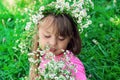 Little girl with a wreath of flowers on her head Royalty Free Stock Photo