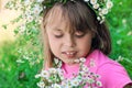 Little girl with a wreath of flowers on her head Royalty Free Stock Photo