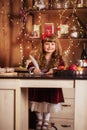 Little girl writes a letter to Santa Claus. Royalty Free Stock Photo