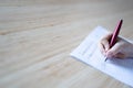 Little girl writing with fountain pen in her notebook Royalty Free Stock Photo