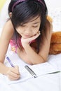 Little girl writing her diary Royalty Free Stock Photo