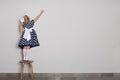 Little girl wrote in chalk on a wall Royalty Free Stock Photo