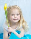 Little girl with yellow flower. Royalty Free Stock Photo