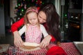 Little girl with young mother baking Christmas Royalty Free Stock Photo