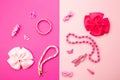Little girls accessories on a pink background, flat lay