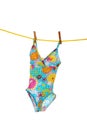 Little girls bathing suit on clothes line