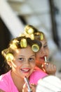 Little girls do makeup sitting in room Royalty Free Stock Photo