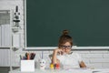 Little girls drawing a colorful pictures with pencil crayons in school classroom. Painting kids. Kids art, creativity Royalty Free Stock Photo