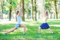 Girls excersise in sunshine park