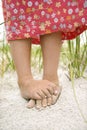 Little Girls Feet in the Sand Royalty Free Stock Photo