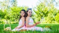 Little girls friends having picnic nature background, celebrate summer