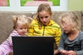 Little girls and laptop Royalty Free Stock Photo