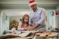 Making Chritmas Biscuits With Dad Royalty Free Stock Photo