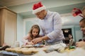 Making Chritmas Biscuits With Dad Royalty Free Stock Photo