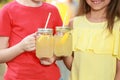 Little girls with natural lemonade. Summer refreshing drink Royalty Free Stock Photo