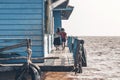 Little girls near the only school in a floating village on the lake Tonle Sap in Cambodia 2019-12-27. Royalty Free Stock Photo