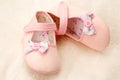 Little girls pink baby shoes Royalty Free Stock Photo