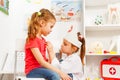 Little girls playing doctor with stethoscope Royalty Free Stock Photo