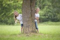 Little girls playing hide and seek