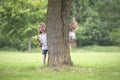 Little girls playing hide and seek Royalty Free Stock Photo