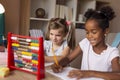 Little girls practising math Royalty Free Stock Photo