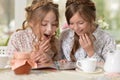 Little girls reading a magazine Royalty Free Stock Photo